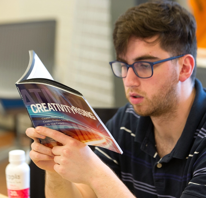 Student reading a book