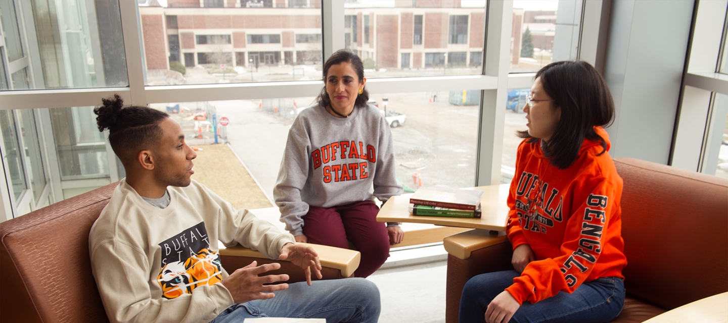 Students talking in a lounge area